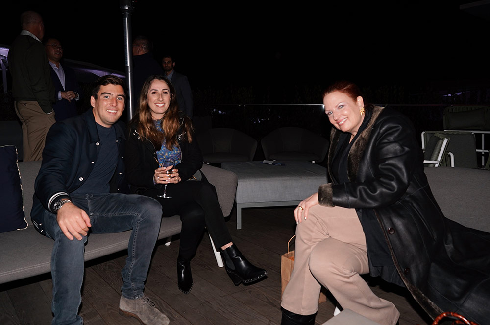 Matt, Danielle, and Kara enjoying the night at Miracle Mile's Year End Meeting.